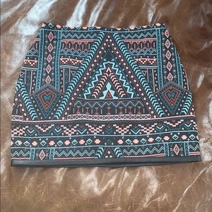 Printed skirt with leather trim